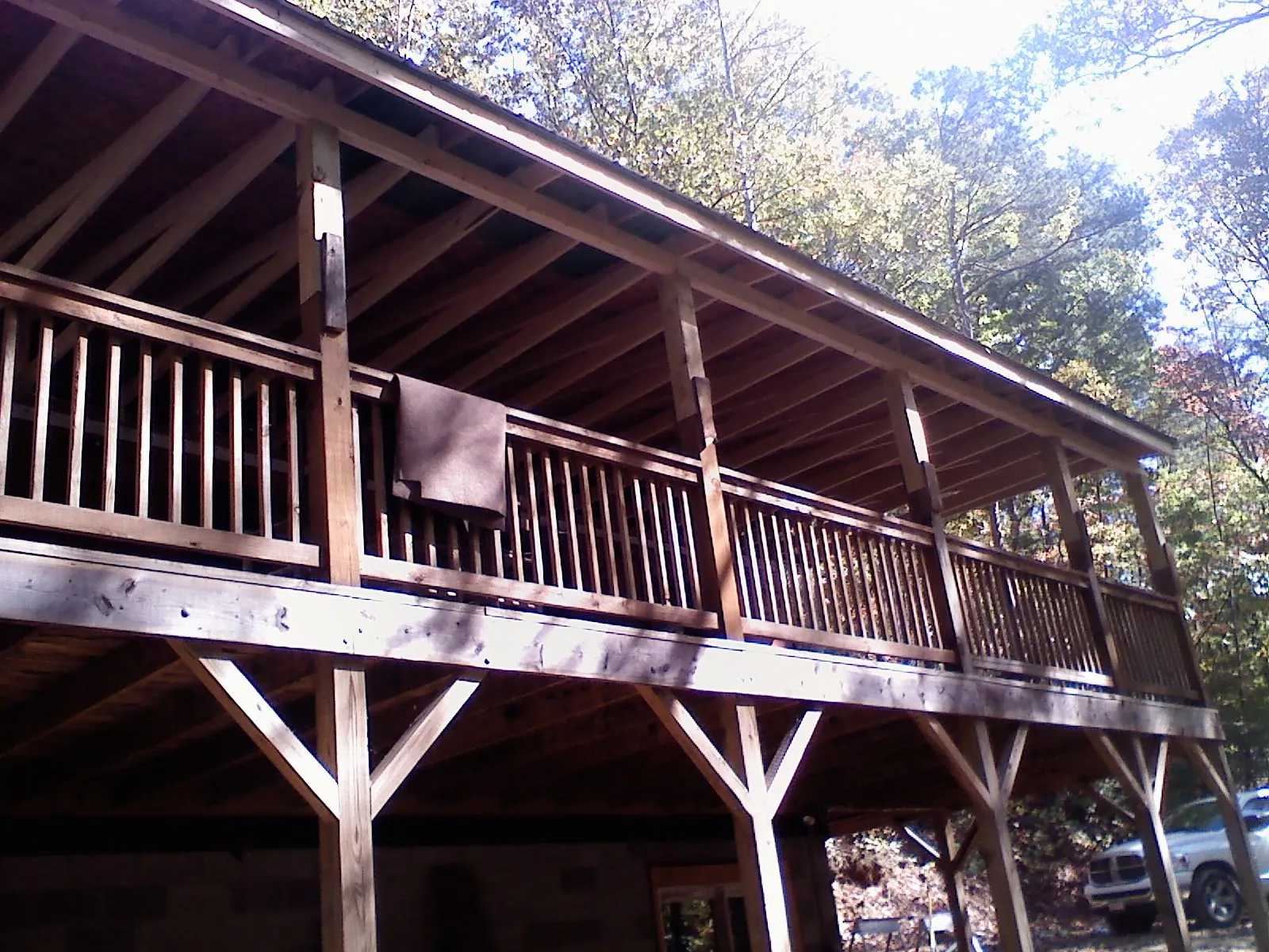 Timber framing under a new elevated porch and deck — Roof Leak Repair in Greenport by Roofing Brothers